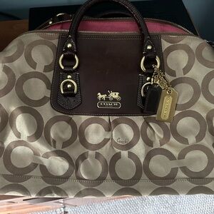 Traditional C Coach handbag with handles  and long strap